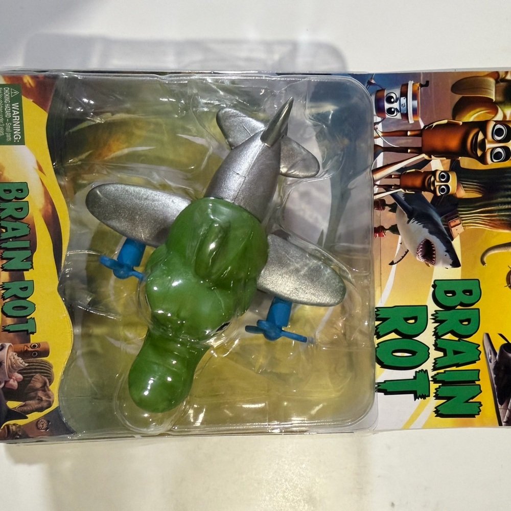 Green and Silver Toy Plane